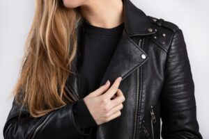 A young female wearing black leather jacket